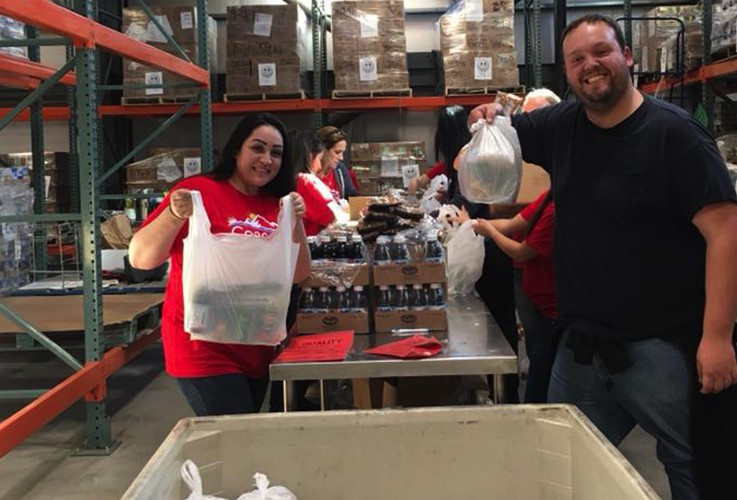 Team members volunteering at food pantry