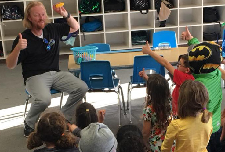 Dr. Forester visiting children's classroom