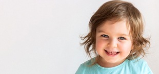 Toddler smiling in San Luis Obispo