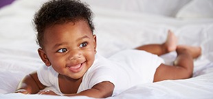 happy baby after their lip or tongue-tie was treated