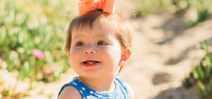 Smiling little girl outdoors