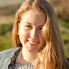 Smiling young woman outdoors