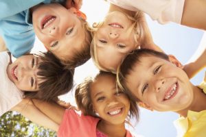 A group of smiling children. 