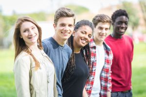 group of smiling teenagers