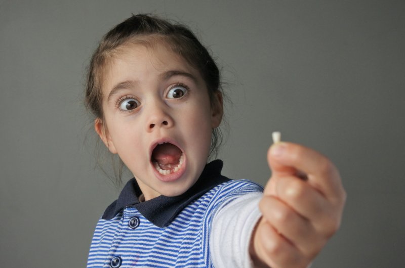 a child with a knocked-out tooth